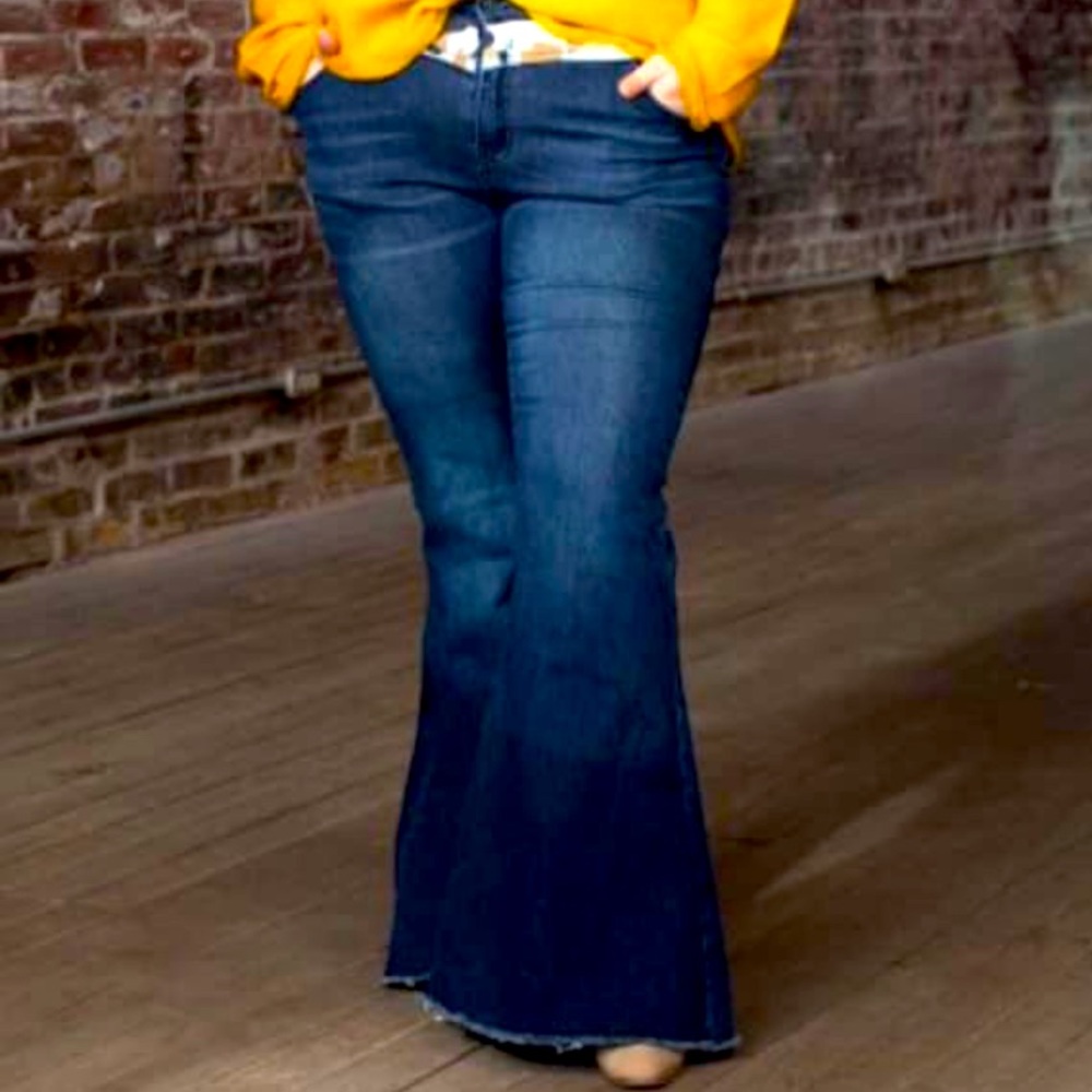 Duo cowhide dark wash mid rise yoke panel flare